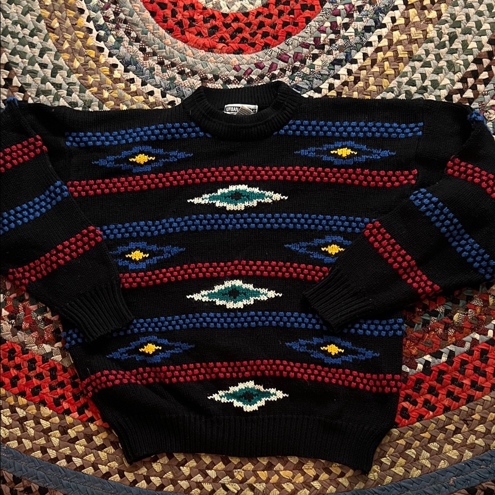 Trendy Black Crewneck Sweater with Red and Blue Patterns